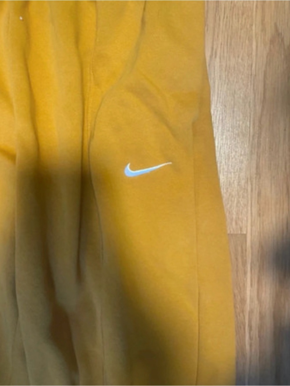 Nike women’s Yellow Sweatpants with White Swoosh